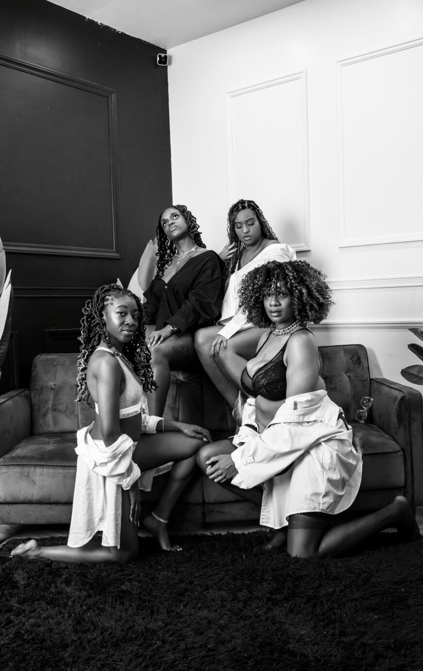 girls-day-out-group-boudoir-session-on-green-couch.jpg