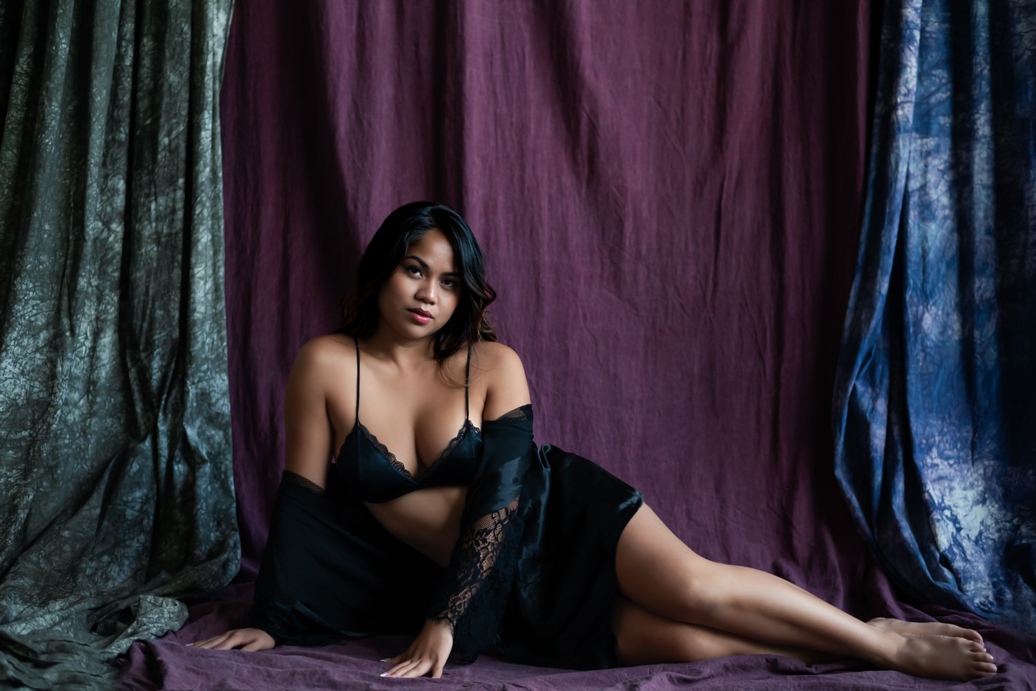 woman beautifully posed in lingerie on the floor